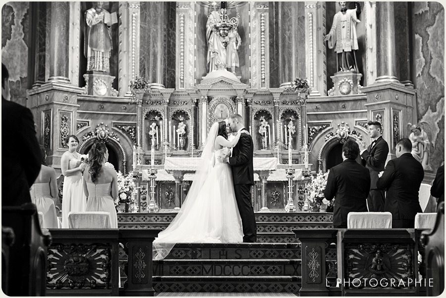  L Photographie St. Louis wedding photography Shrine of St. Joseph Kemoll's 18.jpg